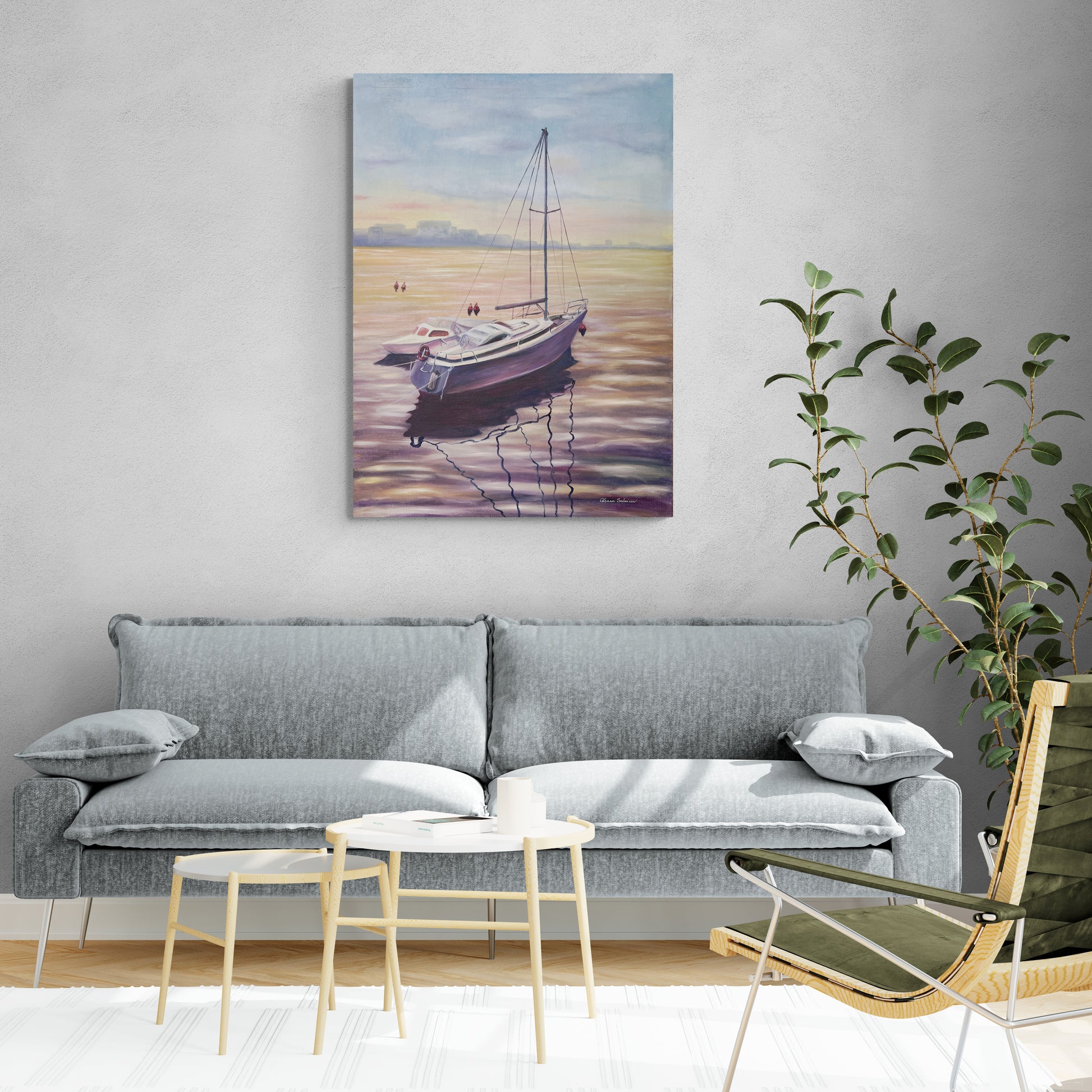 Sunlit room with sofa and painting on the wall