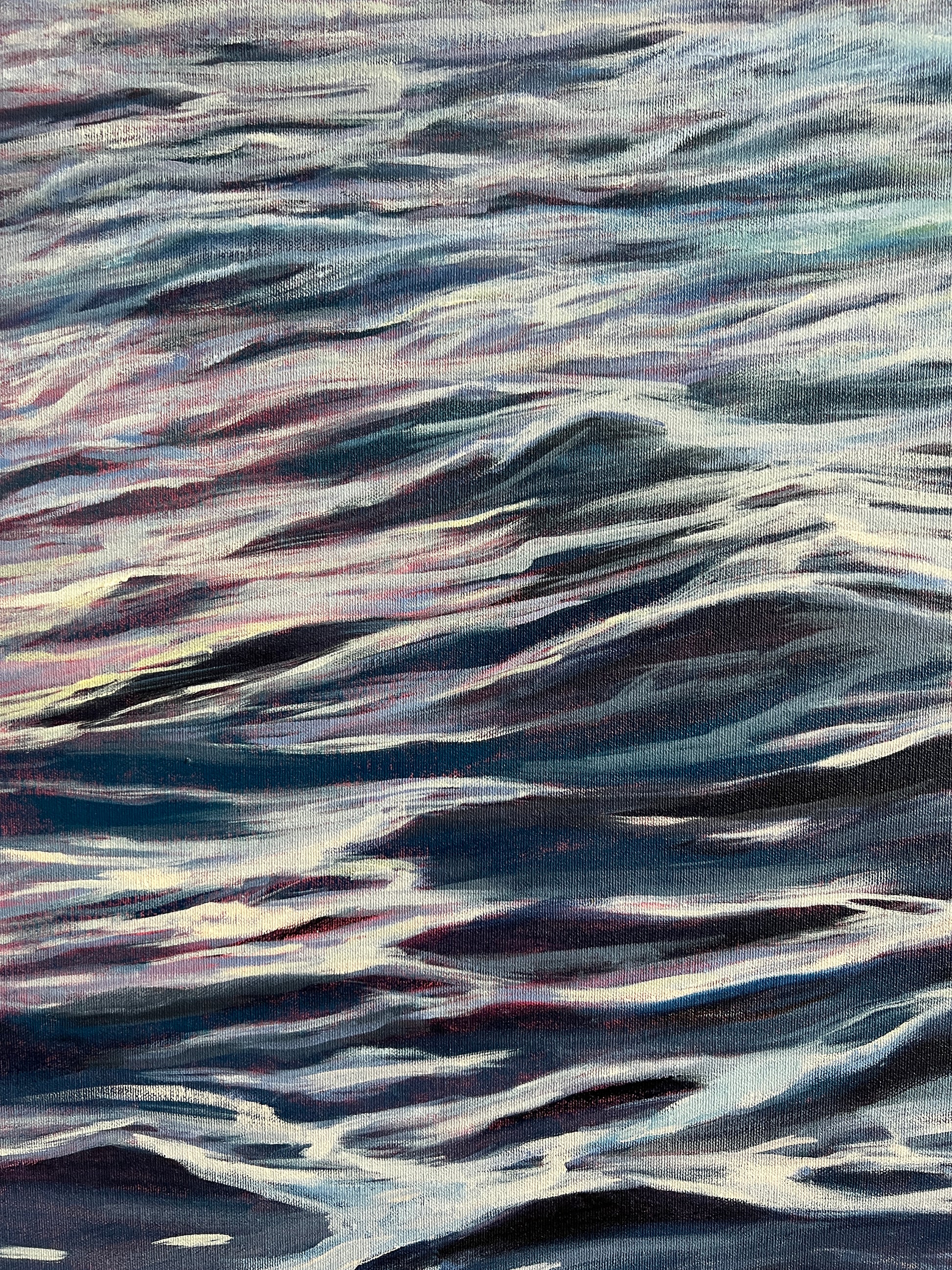 Abstract pattern of wavy lines in black, white, and gray on a textured fabric background