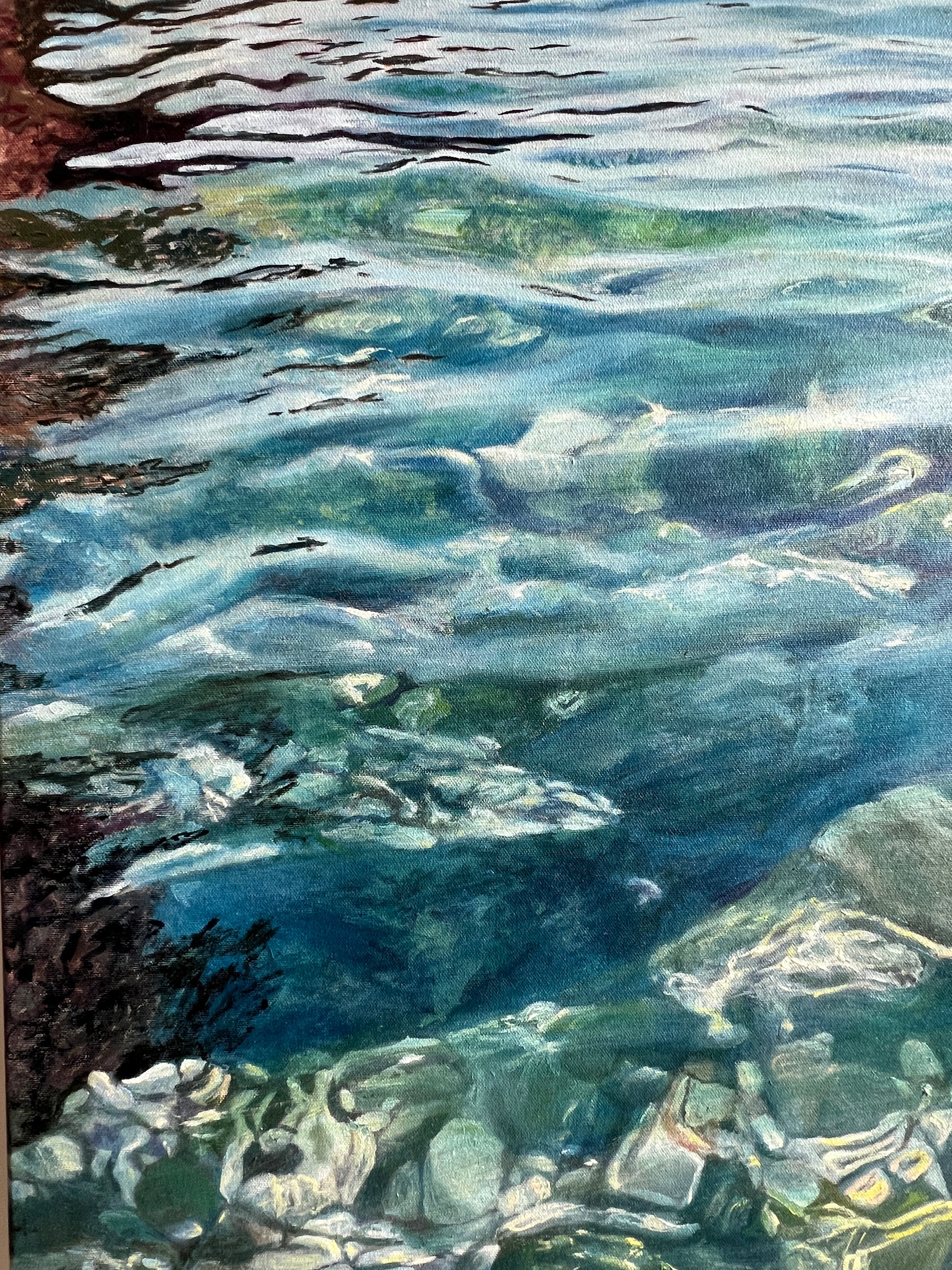 Close-up of a textured surface with blue, green, and brown colors