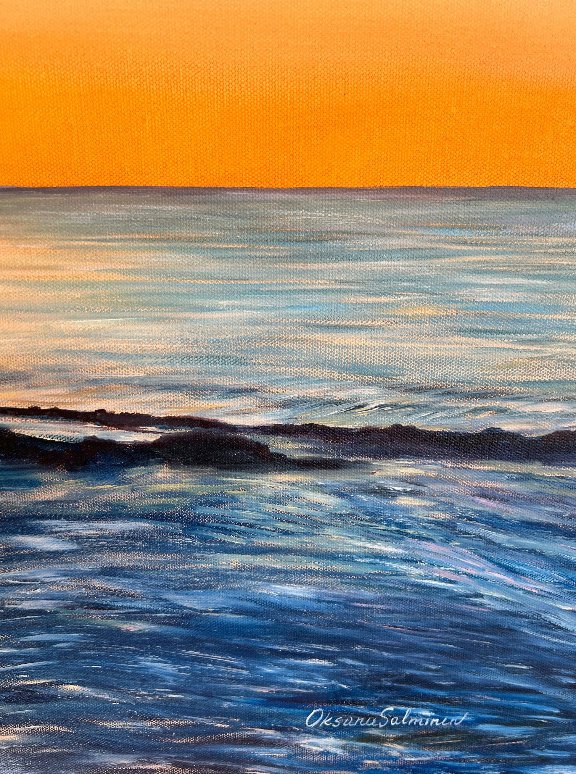 Painting of a sunset over a calm ocean with the artist's signature at the bottom right corner.