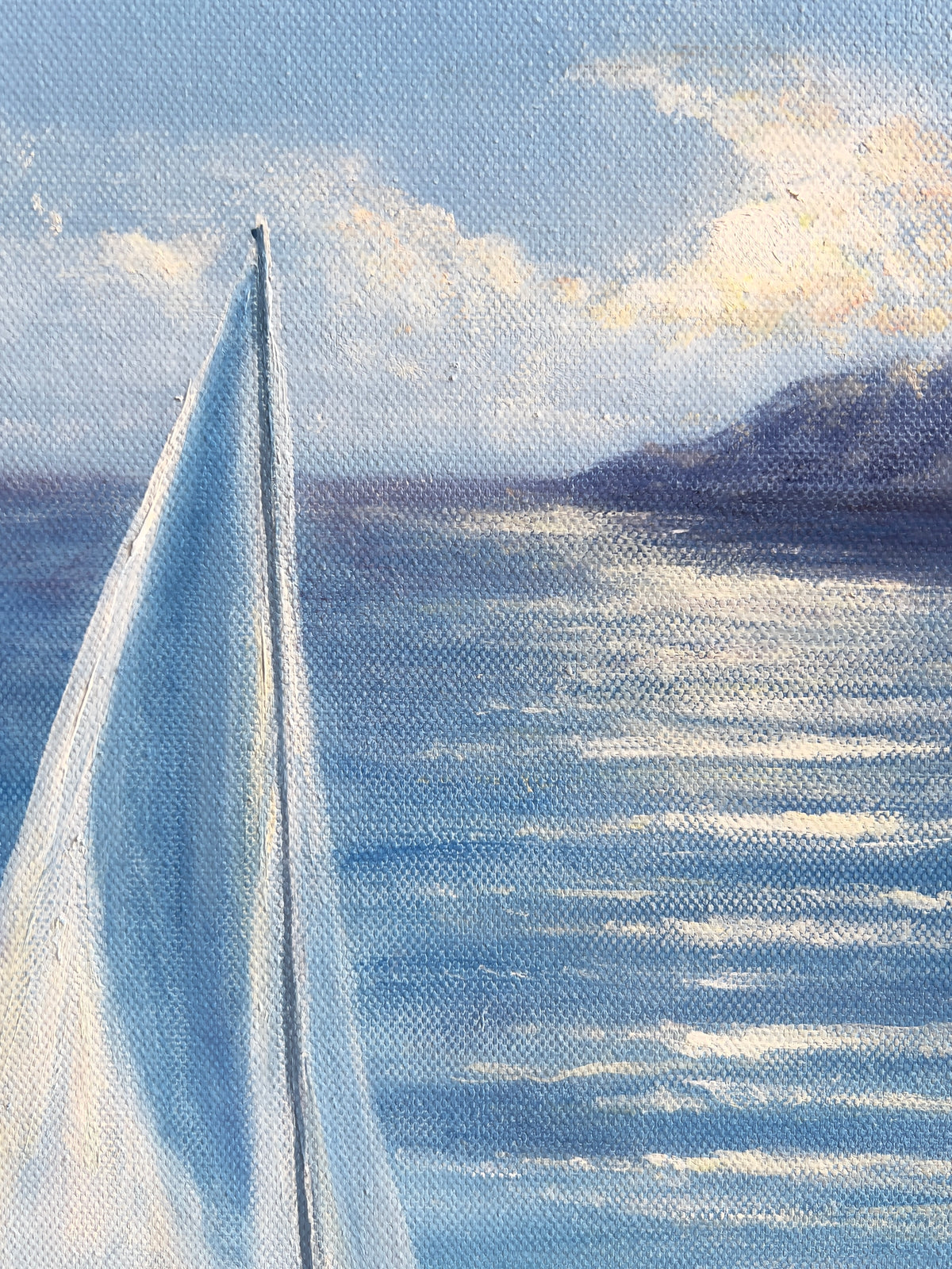 A close-up painting of a sailboat with a white sail and mast against a blue ocean under a cloudy sky, with a dark landform visible in the distance.