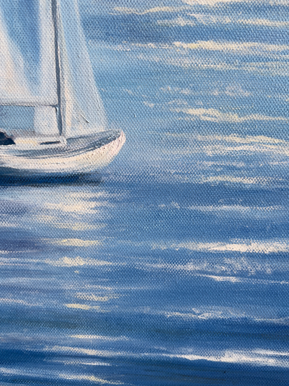 A close-up of a painted seascape showing a white sailboat on blue water with white wave reflections.