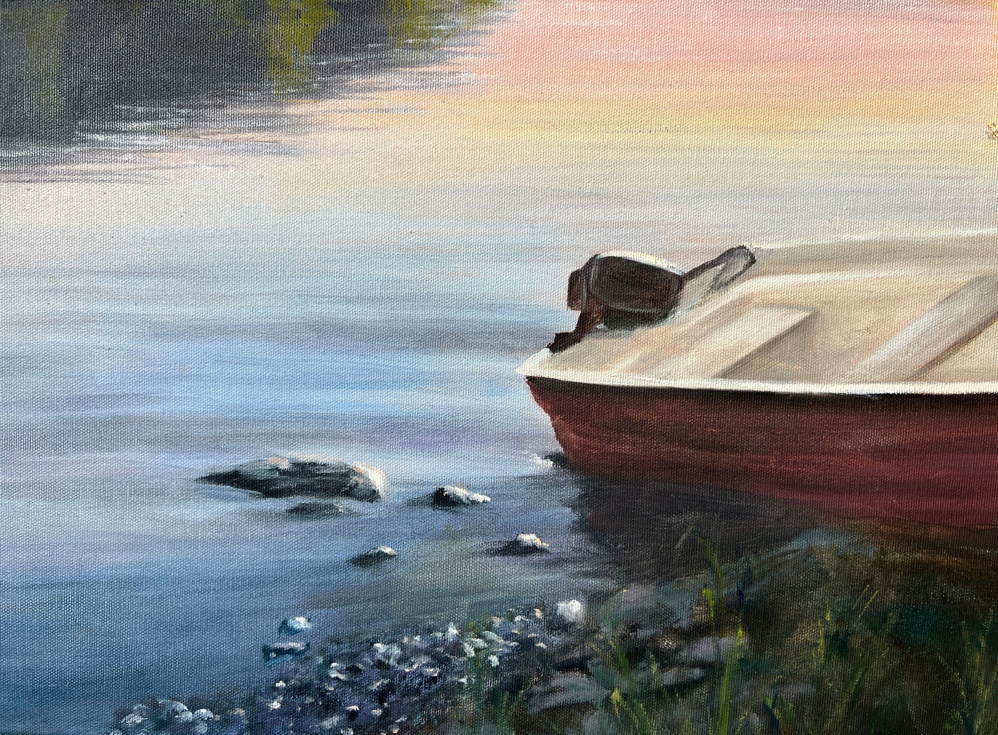 Boat on a lake at sunset