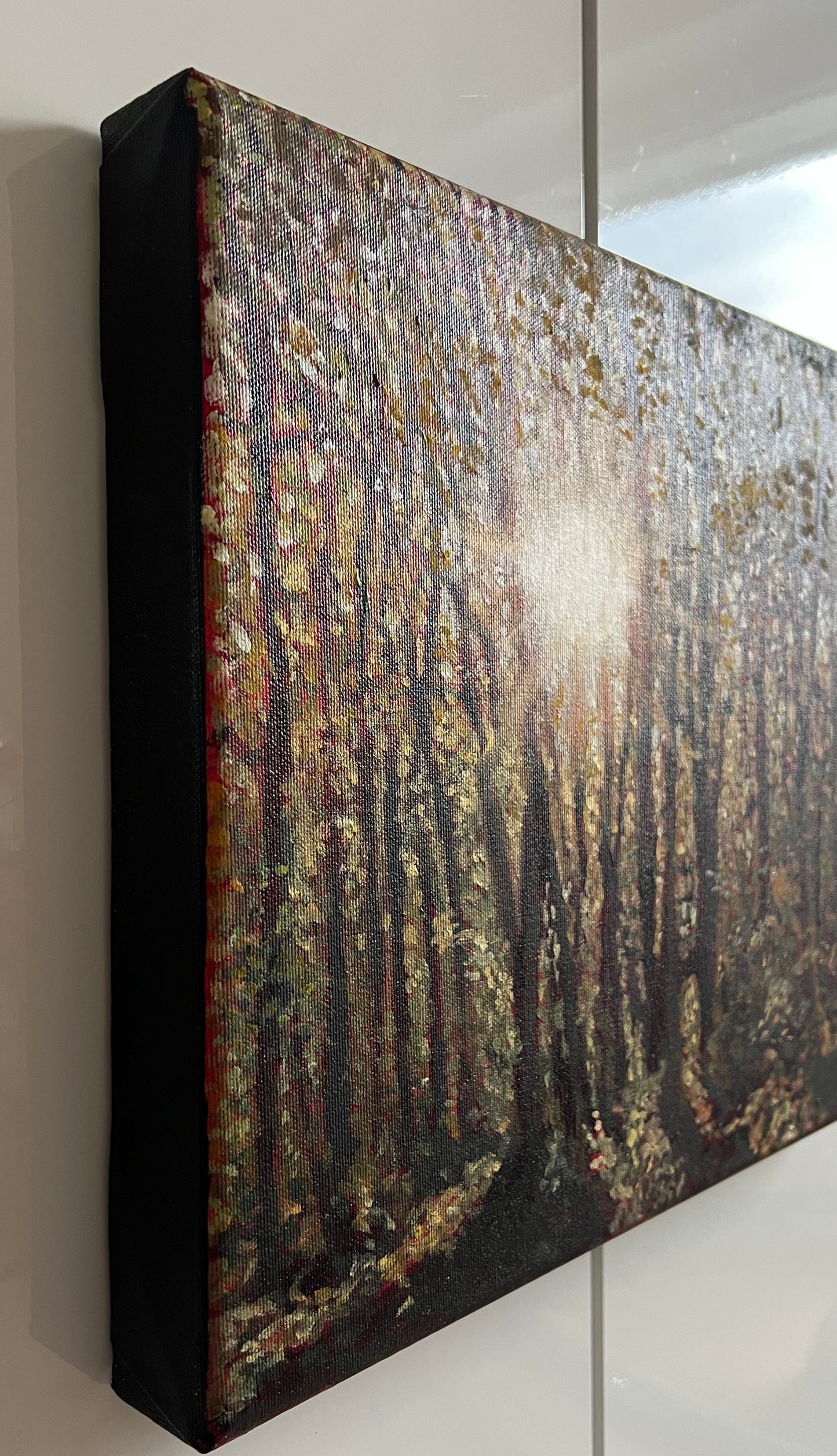 Abstract art piece on a canvas with a textured surface